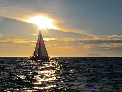sail boat on body of water during daytime thumbnail