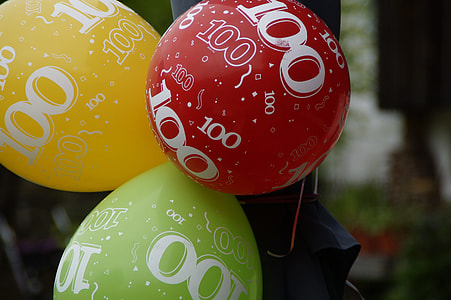 red,yellow and green balloons intact in black textile thumbnail