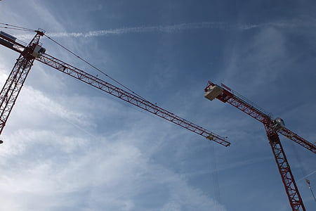 two red crane machines thumbnail