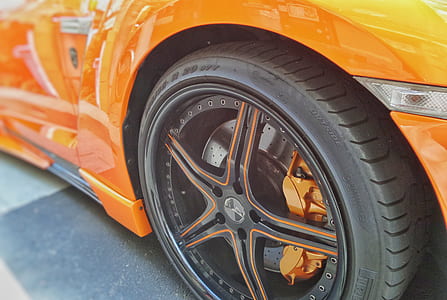 black car wheel with tire thumbnail