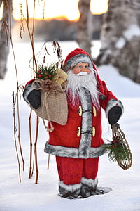 selective focus photography of Santa Claus figurine thumbnail