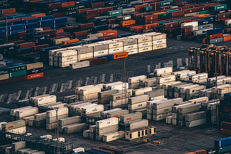 pile of white and gray shipping containers at daytime thumbnail