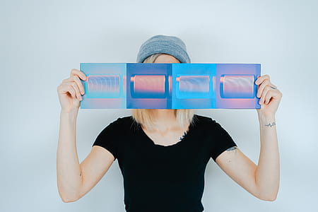 woman holding paper with white background thumbnail