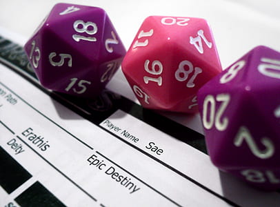 close-up photography of three assorted-color dice thumbnail