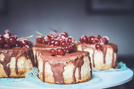 baked cakes with berries on top thumbnail