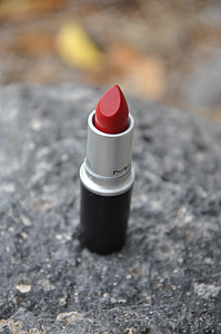 selective focus photography of Red MAC Lipstick on rock thumbnail
