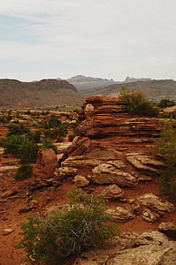 Brown Rocky Mountain Under White Cloudy Sky thumbnail