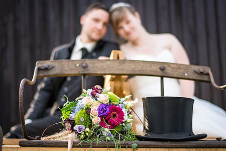 man sitting beside woman thumbnail