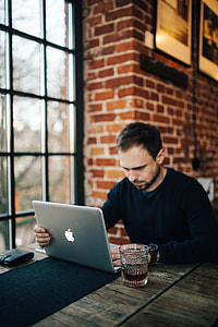 Young Entrepreneur Working from a Modern Cafe thumbnail