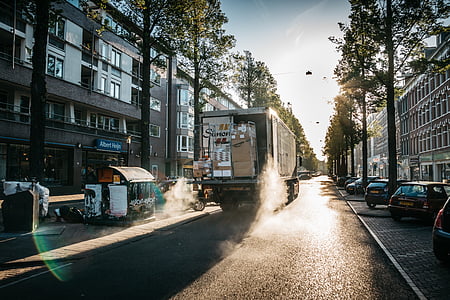 cars parked near buildings and road thumbnail