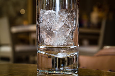 drinking glass filled by ice selective focus photography thumbnail