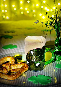 green glass mug with beverage and bread thumbnail