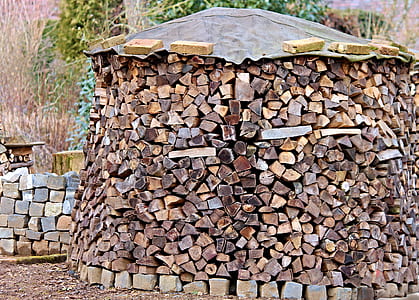 firewood lot on concrete bricks thumbnail