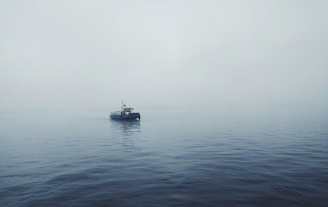 gray boat on body of water thumbnail
