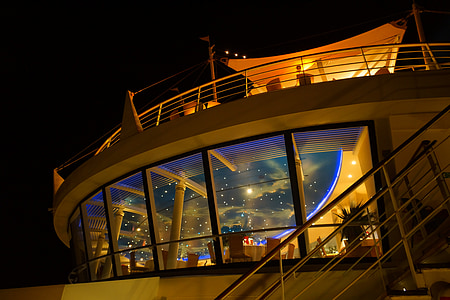 white cruise ship at night thumbnail