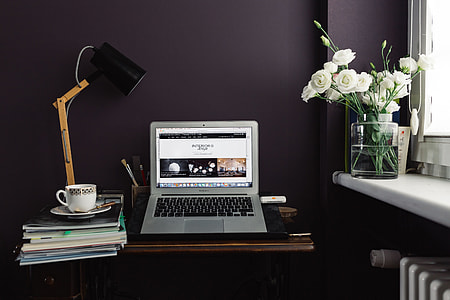 Contemporary home office idea with dark walls thumbnail