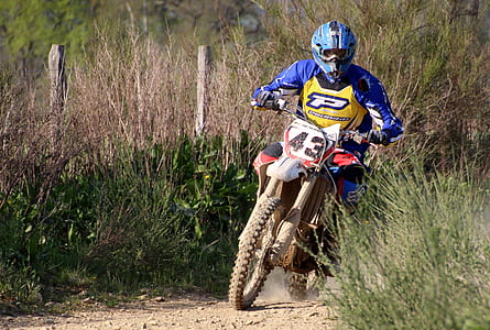 man riding motorcycle during daytime thumbnail