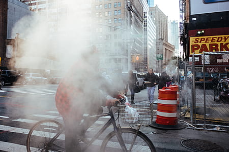 person riding on black bike thumbnail