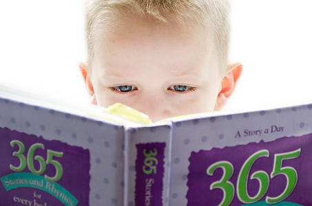 boy holding a 365 story book thumbnail