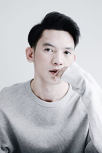 man in gray sweater thumbnail
