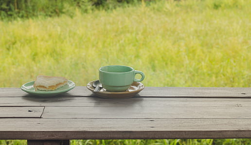 teal ceramic teacup on saucer thumbnail