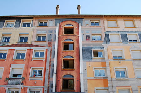 brown and beige building thumbnail