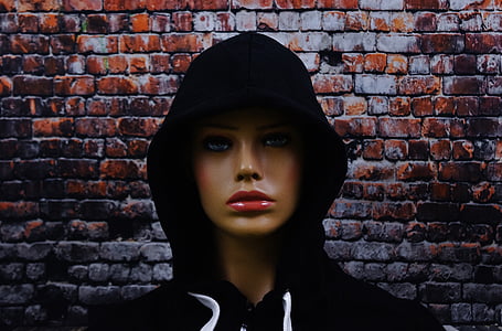 girl mannequin wearing black pullover hoodie thumbnail