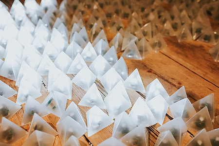 Little triangle lights on a wooden floor thumbnail