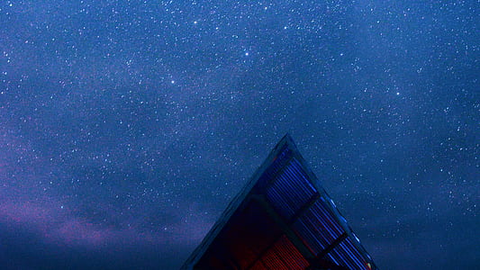 house roof under starry skies thumbnail