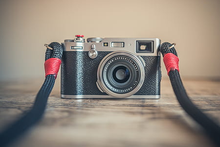 gray and black MILC camera thumbnail