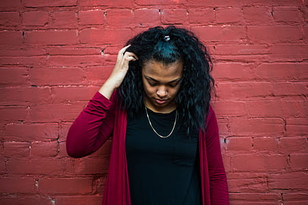woman bowing holding hair thumbnail