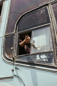 person inside gray vehicle thumbnail