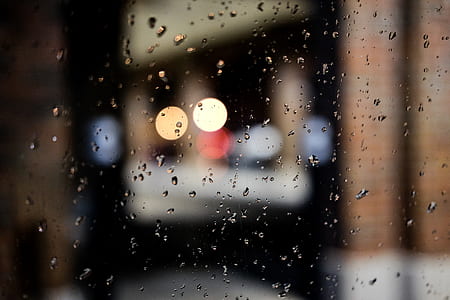 selected focus photo of water droplets clear glass board thumbnail