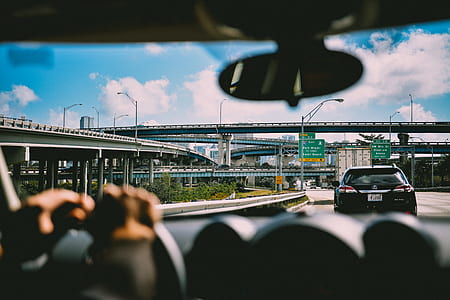 person travelling on road during daytime thumbnail