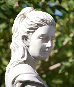 woman white figurine during daytime thumbnail