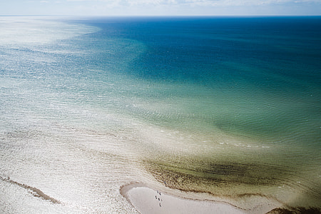 blue and green ocean at daytime thumbnail