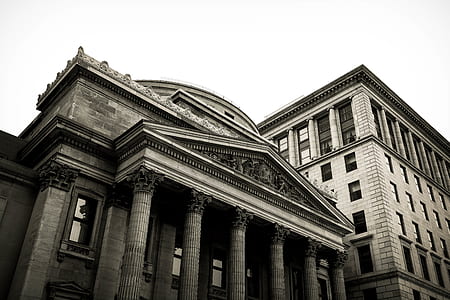 low angle photo of gray concrete building thumbnail