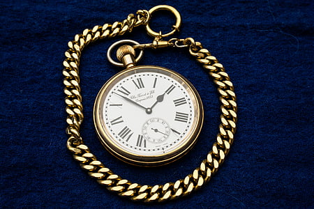 gold-colored pocket watch thumbnail