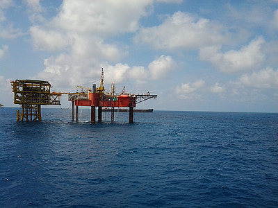 oil rig on body of water thumbnail