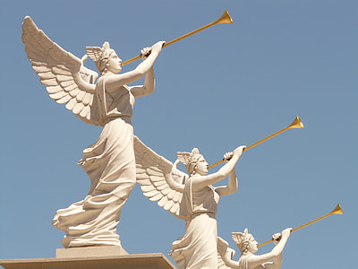 three white painted concrete Angel playing trumpets during daytime thumbnail