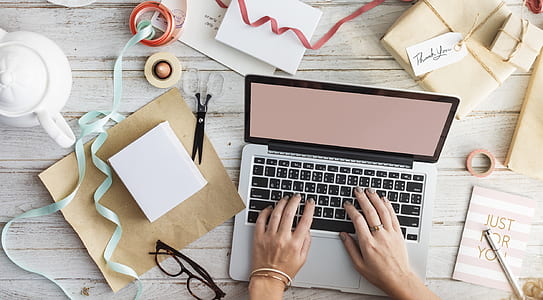 person using MacBook Pro thumbnail