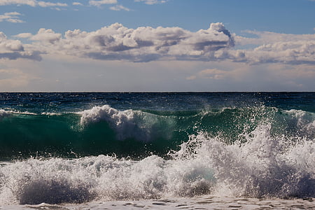 photo of sea waves hitting shore thumbnail
