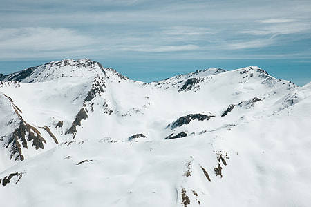 photo of snowy mountain during daytime thumbnail