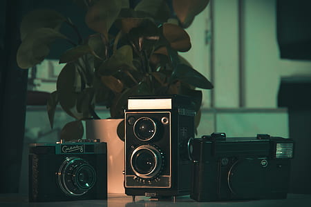 several black cameras on table thumbnail