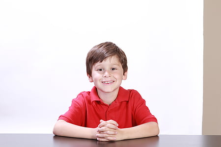 photo of boy wearing red polo shirt thumbnail