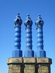three blue pillars during daytime thumbnail