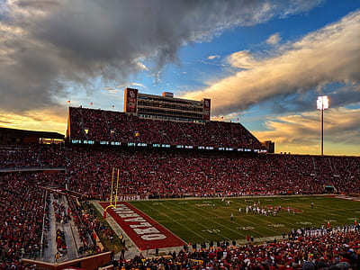 group of people attending a football game thumbnail