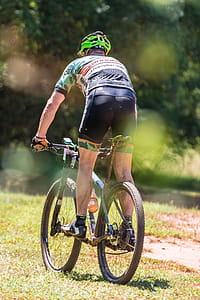 Photo of Person Riding Bicycle thumbnail
