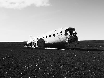 grayscale photo of plane wreck thumbnail