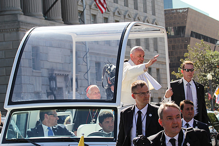 Pope Francis in white vehicle thumbnail